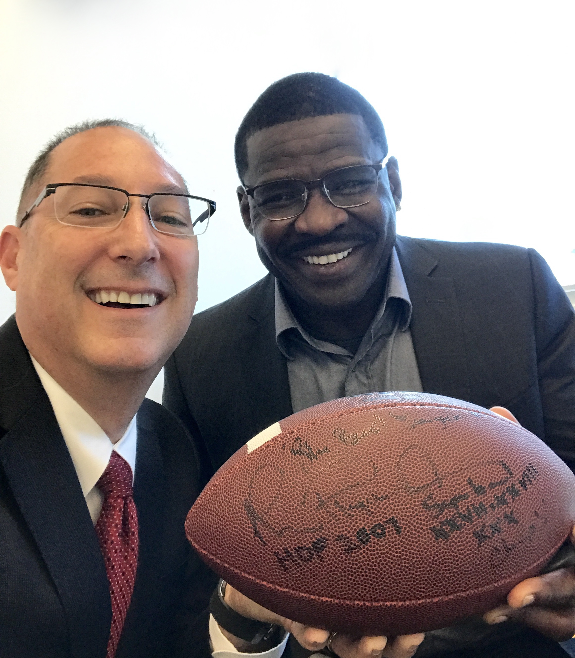 Ken Padowitz | Fort Lauderdale Criminal Defense Lawyer | Ken Padowitz with NFL Michael Irvin “The Best Lawyer” signed football