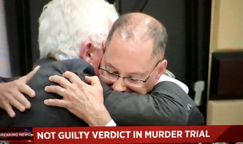 Kenneth Padowitz | Broward Criminal Defense Attorney hugging client after not guilty in murder trial